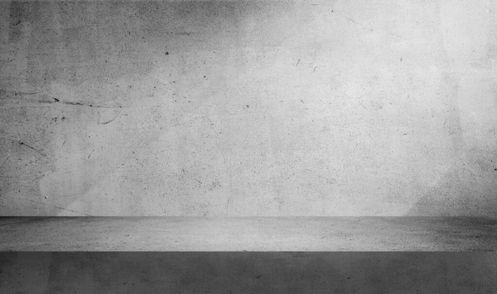  The black and white image of a concrete wall in an empty room in Texas and Louisiana. 